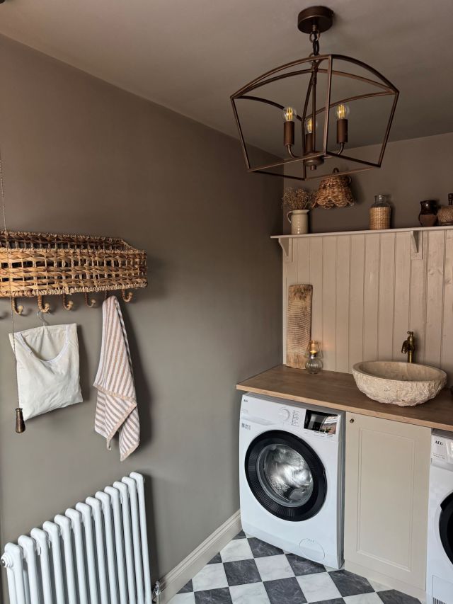traditional utility room with black and white checkerboard floor